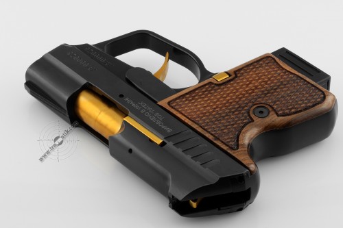 19. Травматический пистолет «SAFARI MINI» (САФАРИ МИНИ) . Позолота и орех. 19. Травматический пистолет «SAFARI MINI» (САФАРИ МИНИ) . Позолота и орех.